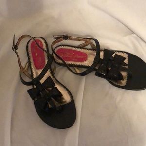Black bowed sandals